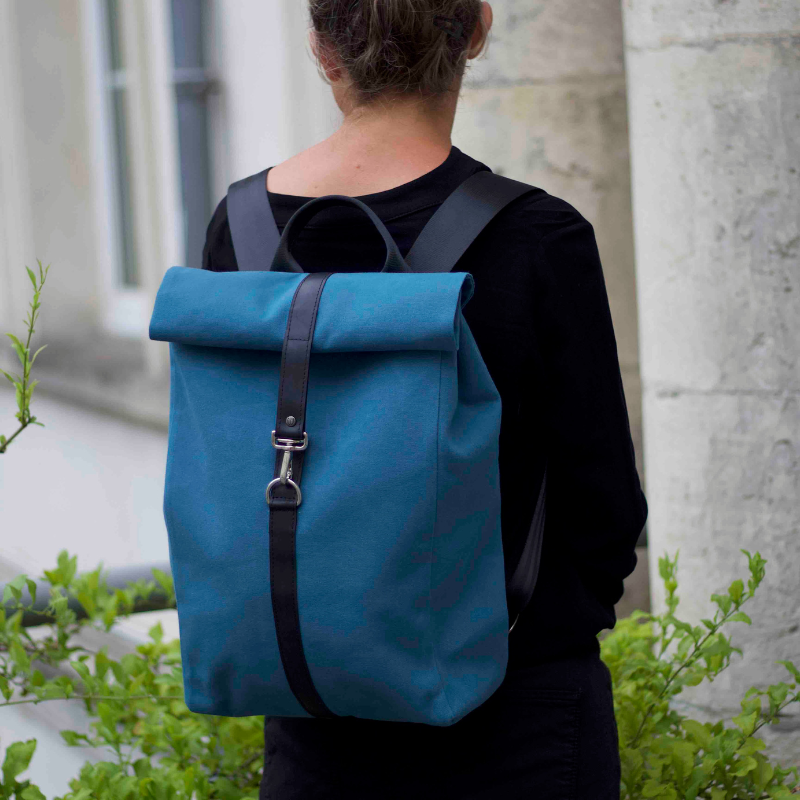 rains messenger backpack in dark teal Jack Bleu work backpack made from upcycled materials